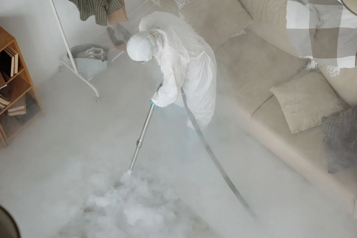 Biohazard cleanup technician in protective equipment, Timberlane, LA